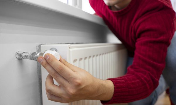 close-up-man-using-rotary-switch
